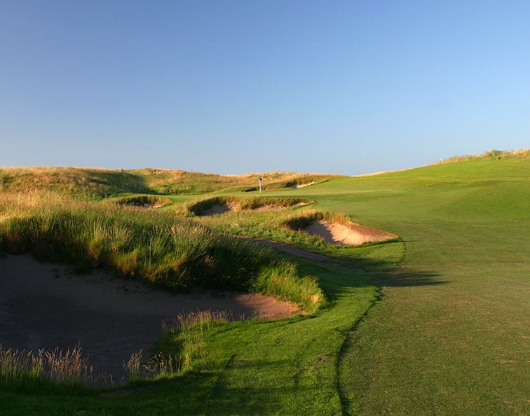 Bunkers on the Moonah course have a natural, ungroomed look achieved with fescue grass around their edges.