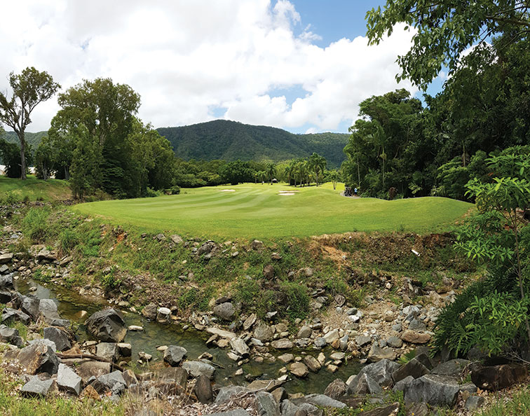 The picturesque fifth hole at Paradise Palms offers a stunning backdrop to your round.