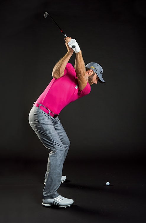 BACKSWING: If the club’s toe points down here, the face is open.