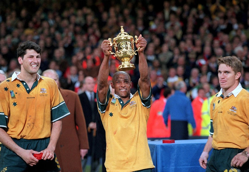 Gregan lifts the Webb Ellis Cup after winning the 1999 Rugby World Cup final against France.
