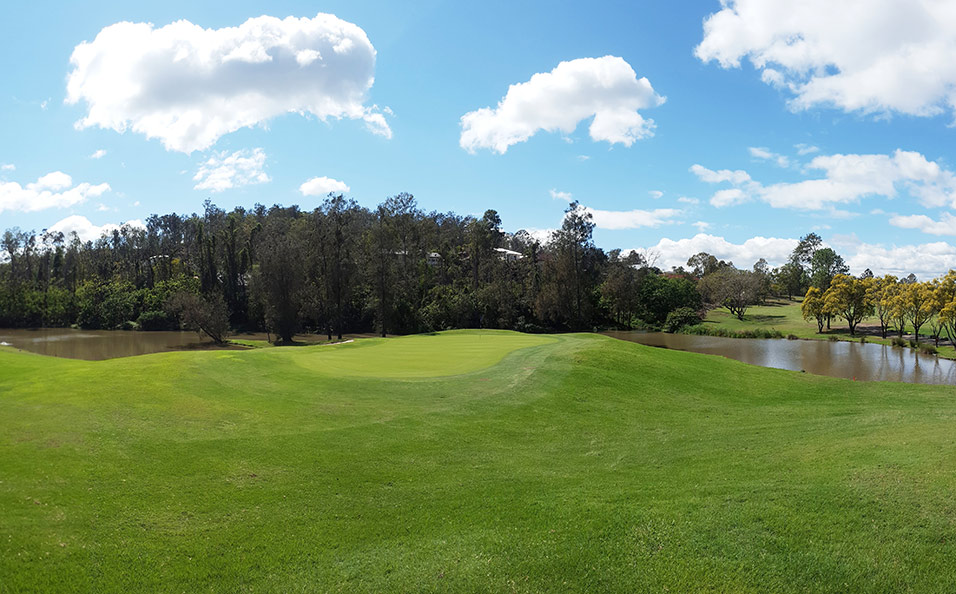 The 295m par-4 15th wraps around a lake to the left and plays to a peninsula green.