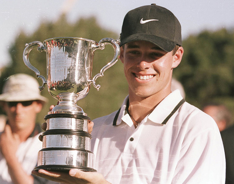 Aaron Baddeley holds the Stonehaven Cup after winning the 1999 Australian Open as an amateur.