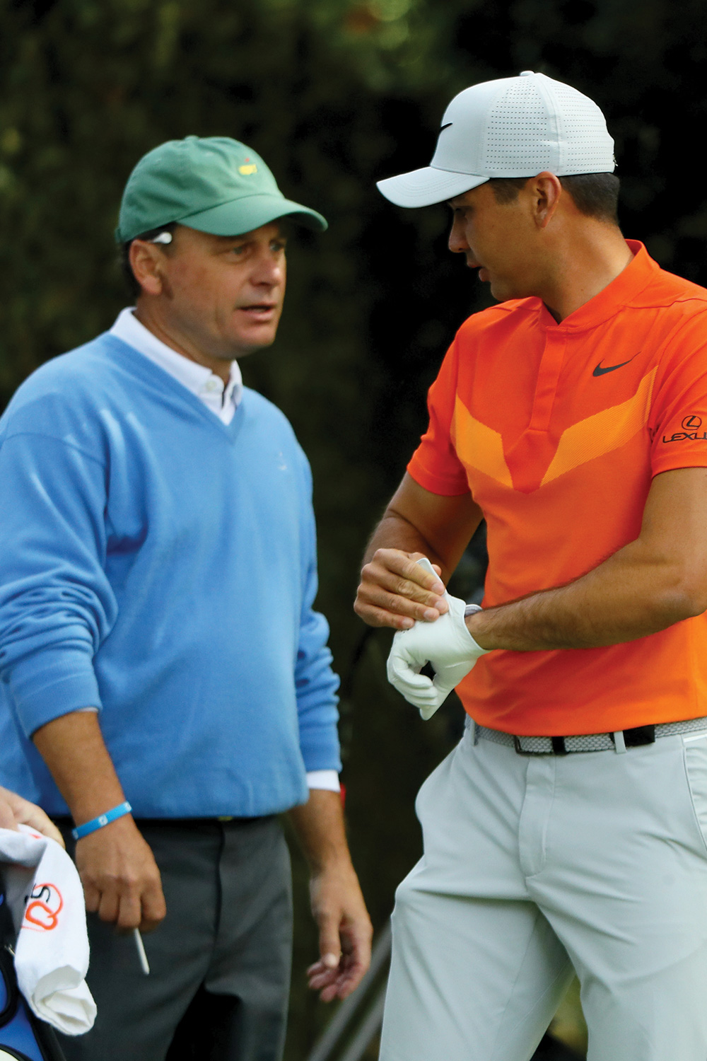 Jason Day and Ernie Els [bottom] are just two superstars Knox has partnered at the Masters.