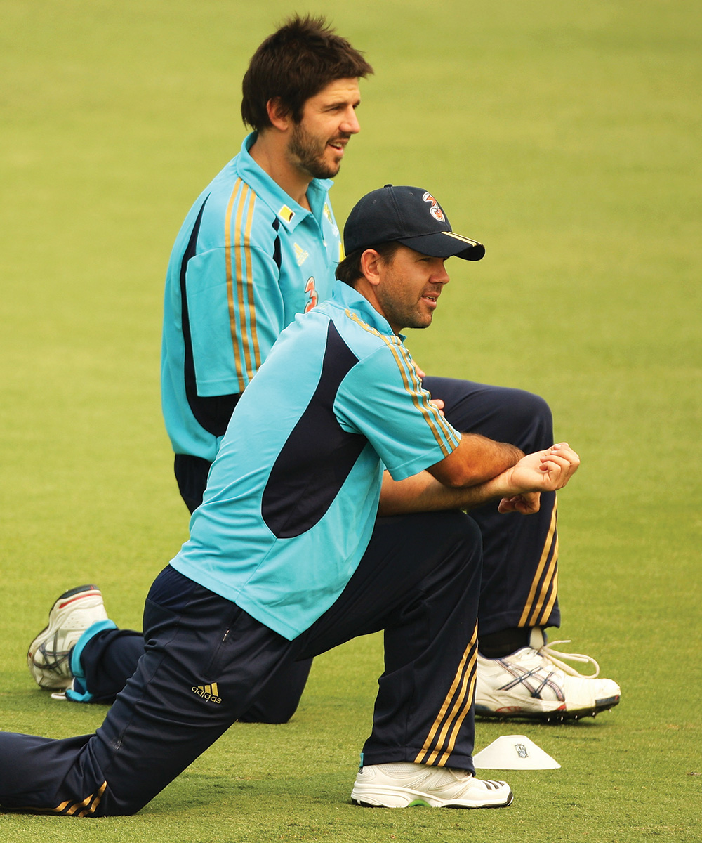 Former Australian cricketer Brett Geeves, pictured stretching with Ricky Ponting, deliberately avoided heavy training to stay pain-free for golf.