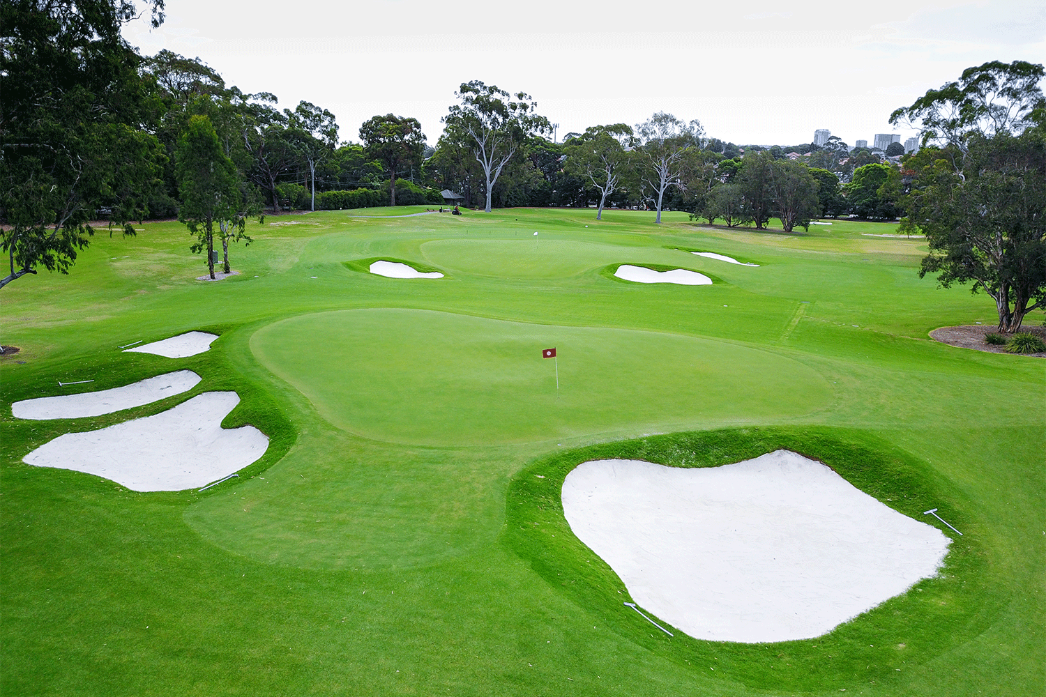 From the 14th tee, the 12th green appears to slide off the rear of the 14th green [right], just one Doak optical illusion at Concord.