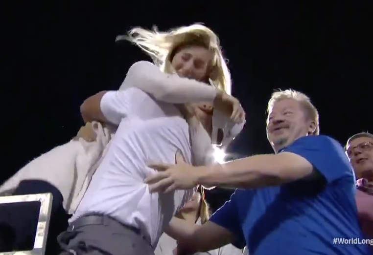World Long Drive champ celebrates in style, thanks his “super hot” wife