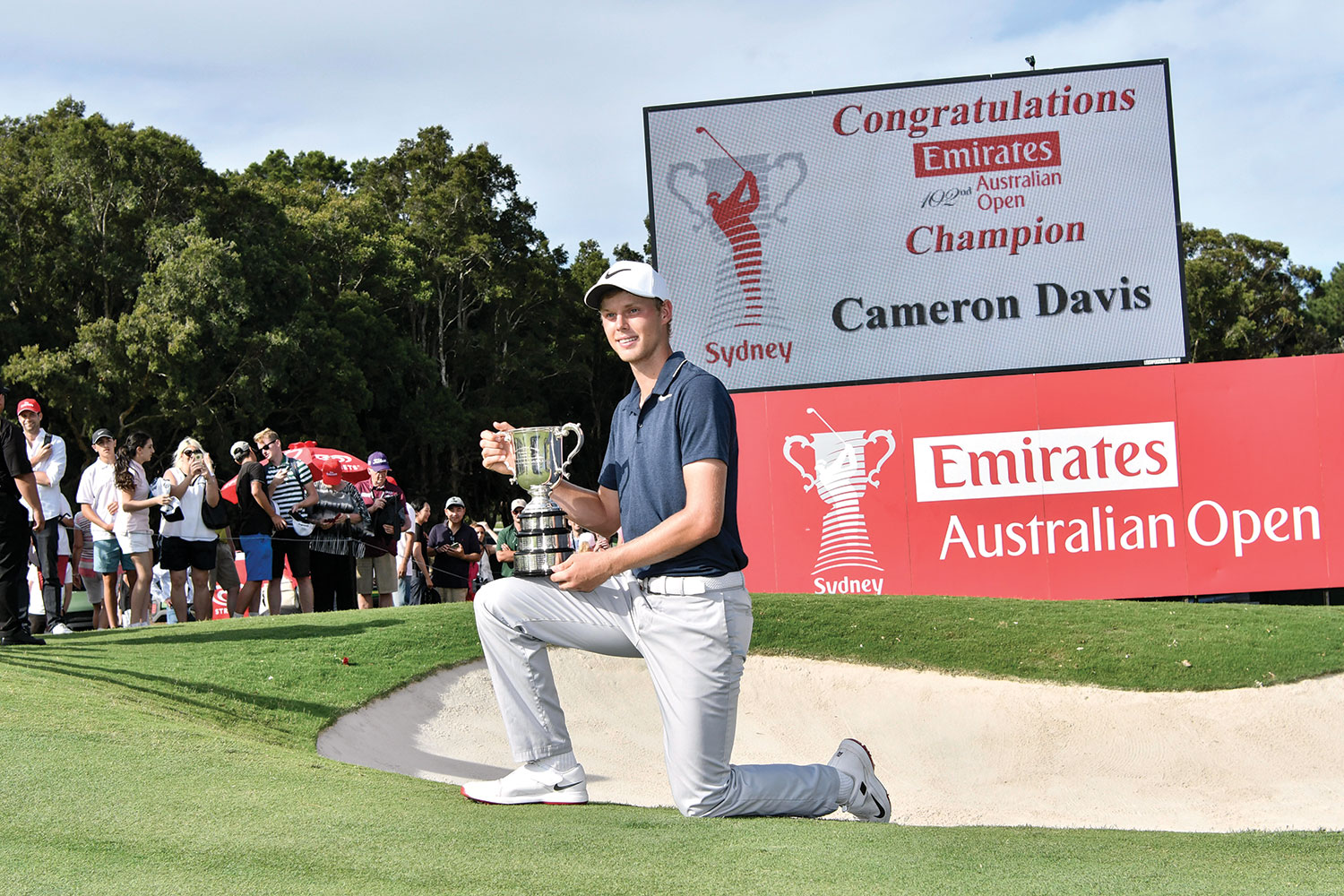 This year’s Australian Open winner will pose in front of different signage.
