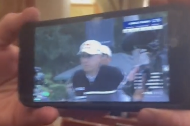 iconic-dad-finds-new-way-to-watch-golf-while-at-wedding
