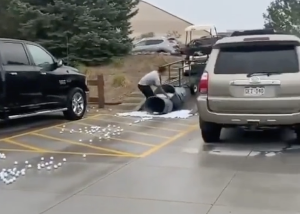 golf-course-employee-spills-hundreds-upon-hundreds-of-golf-balls,-should-just-call-it-a-day