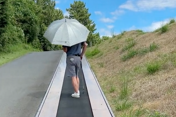 this-yokohama-golf-course-has-moving-walkways-to-combat-hilly-terrain,-japan-continues-living-in-2050