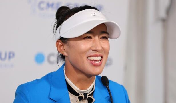 the-smiley-face-stitched-on-amy-yang’s-visor-comes-with-its-own-inspiring-story