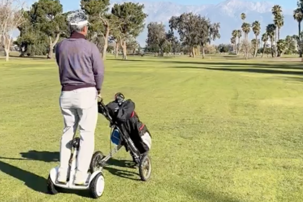 golfer-gets-paired-with-random-who-segways-around-course,-the-future-is now