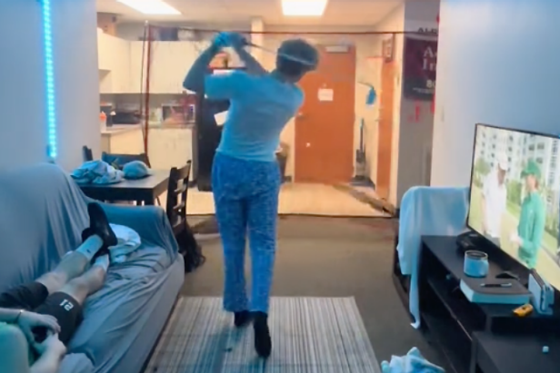 dudes-set-up-golf-practice-net-in-their-dorm-room,-are-living-the-college-dream