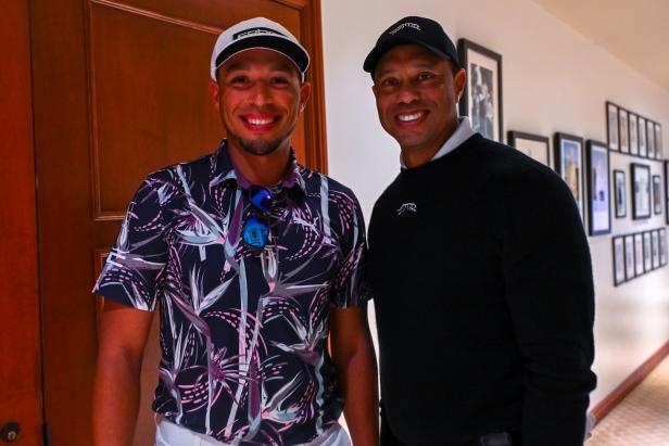Golf pro finally talks to his idol Tiger Woods and gets his autograph? Uh, no