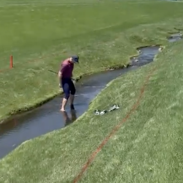justin-rose-attempts-heroic-recovery-shot-from-creek-to-try-to-win-$100-bet-against-shane-lowry